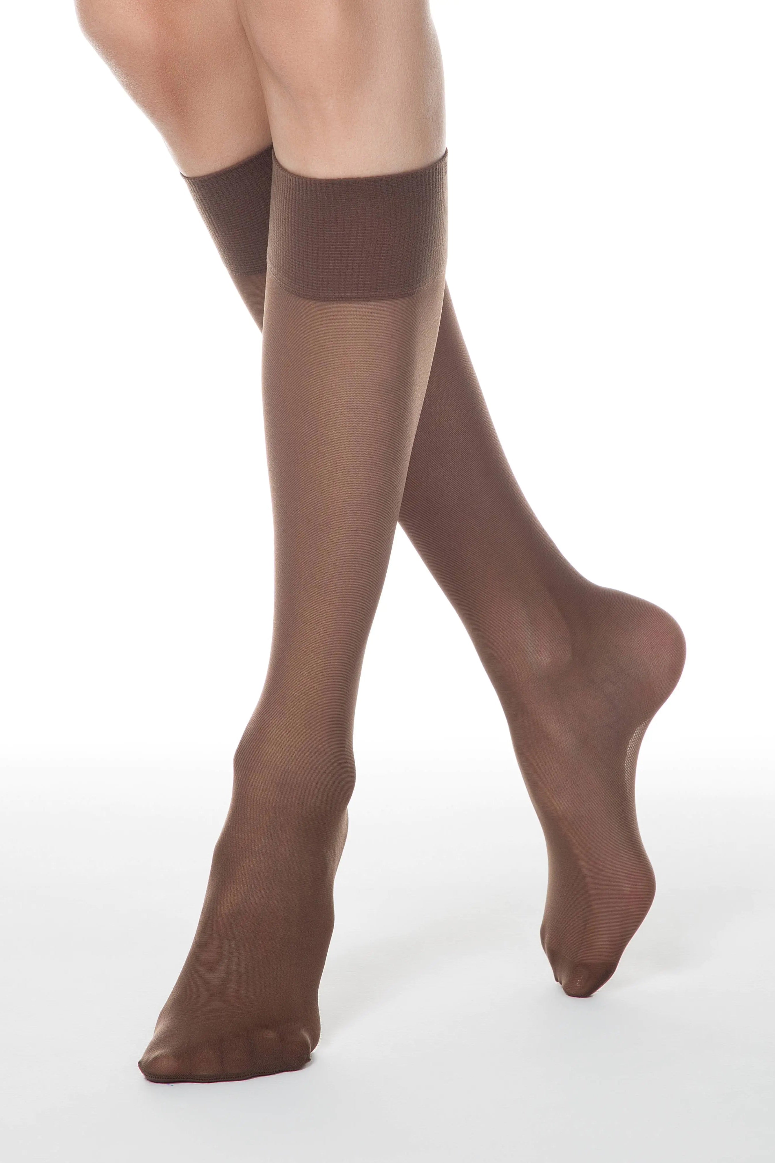 Brown tights worn by a person on a white background #color_mocca-brown