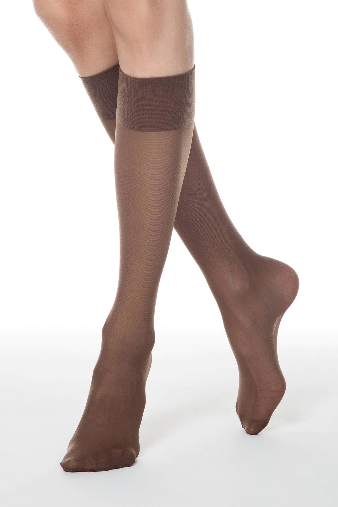 Brown tights worn by a person on a white background #color_mocca-brown
