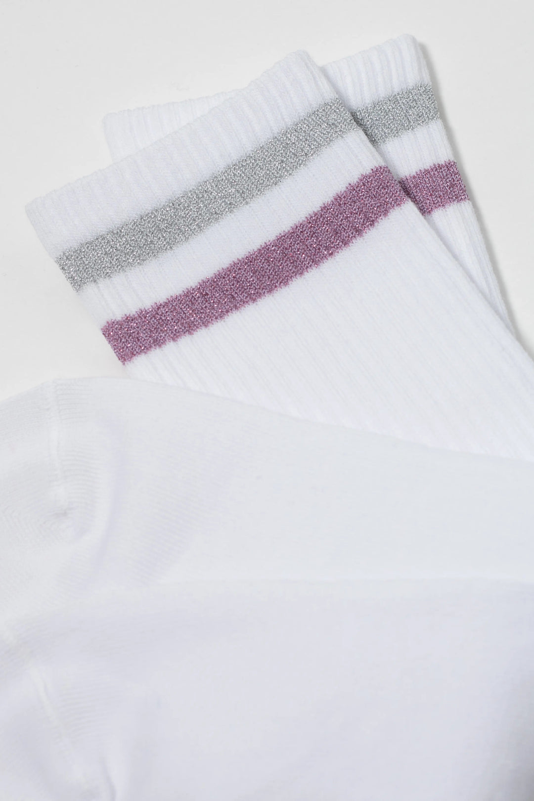 White socks with gray and pink stripes on a white background #color_light-gray