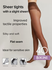 A model's legs wearing sheer brown bikini-style tights against a light gray background, with text highlighting features like 'Sheer tights with a slight sheen' and 'Improved tactile properties'.