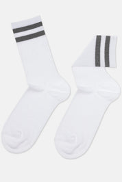 White socks with gray stripes on a light gray background #color_gray