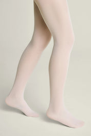 Light pink tights worn by a person on a neutral background #color_bianco