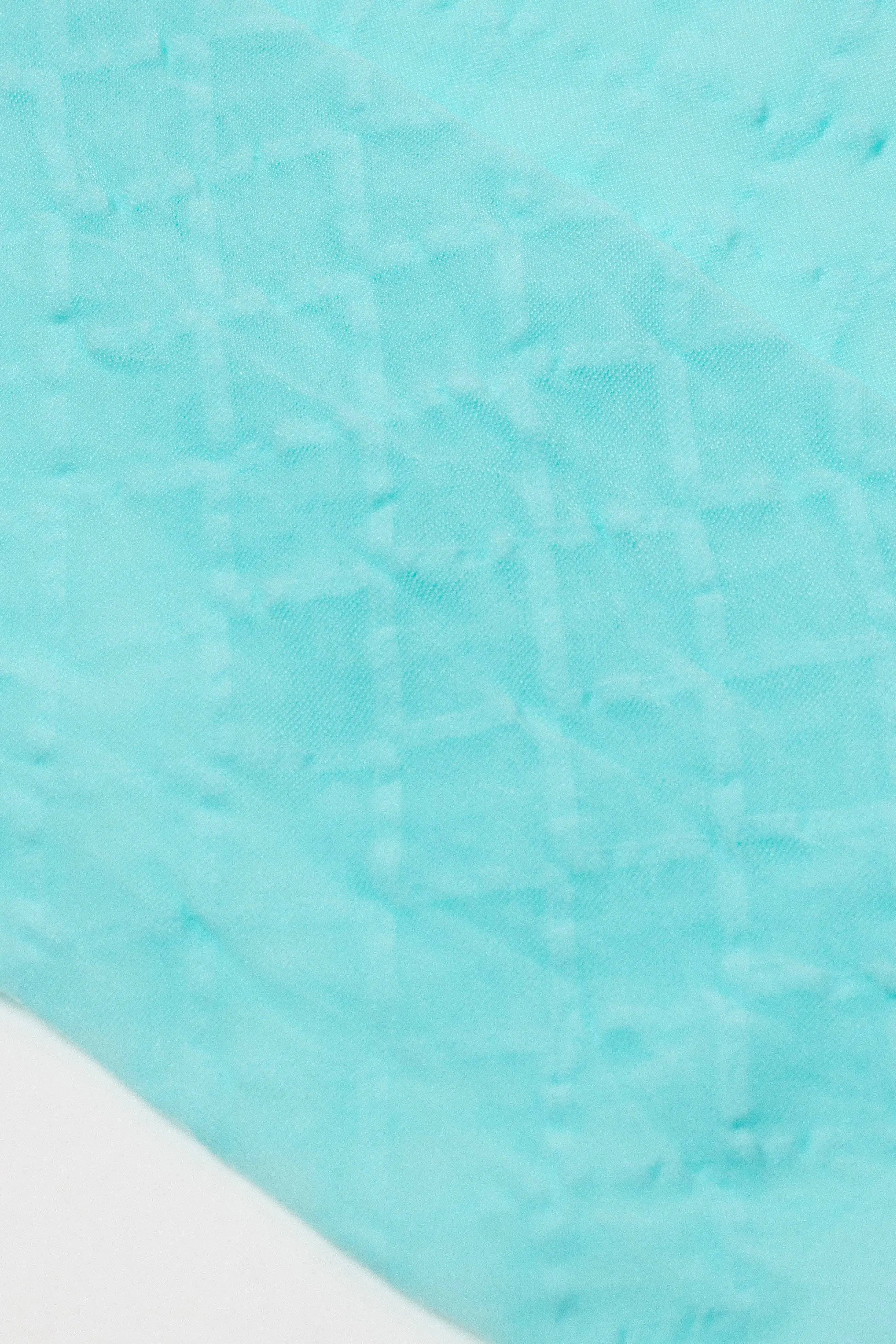 Close-up of turquoise fabric texture #color_turquoise