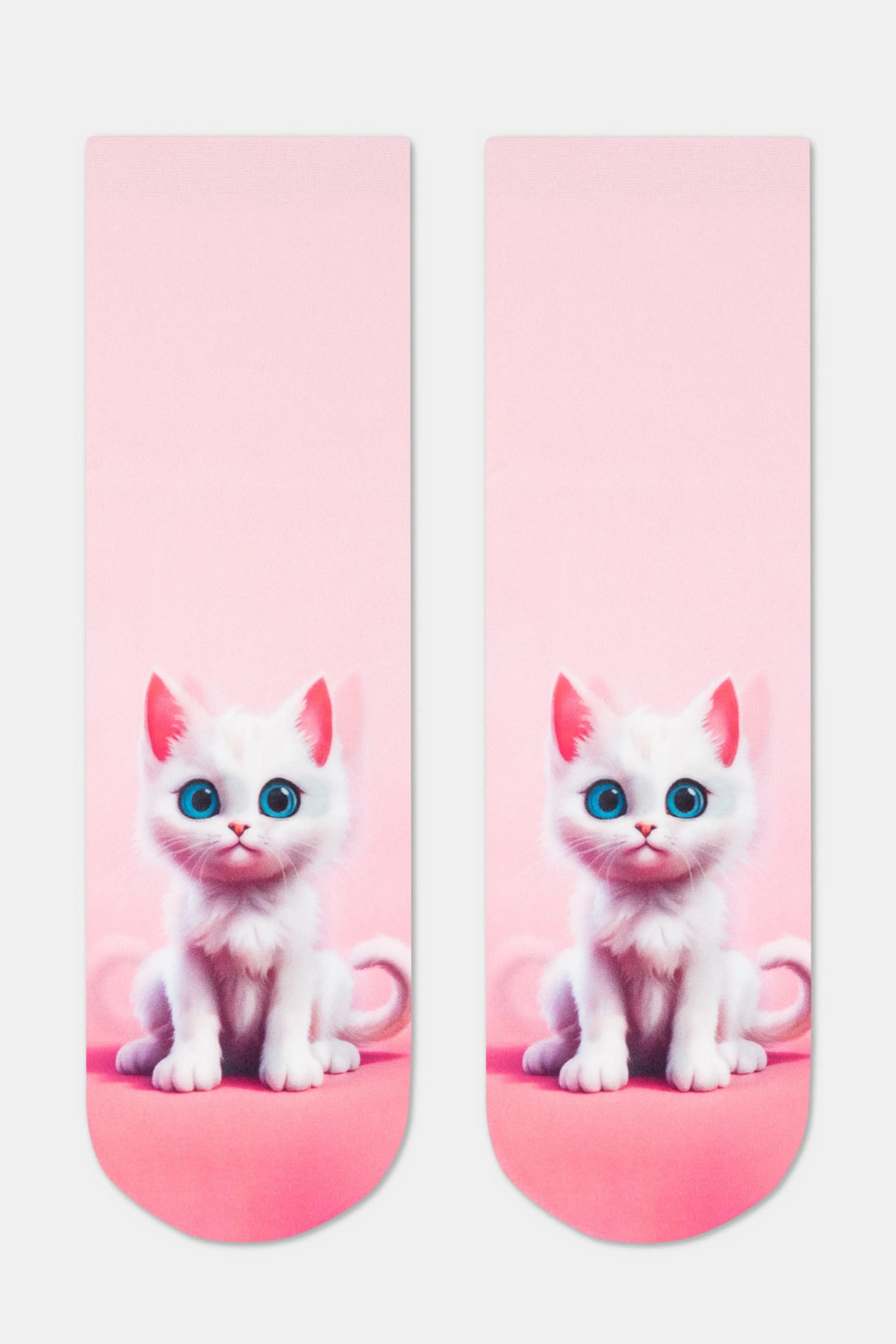 Pair of socks with a design of a white cat on a pink background