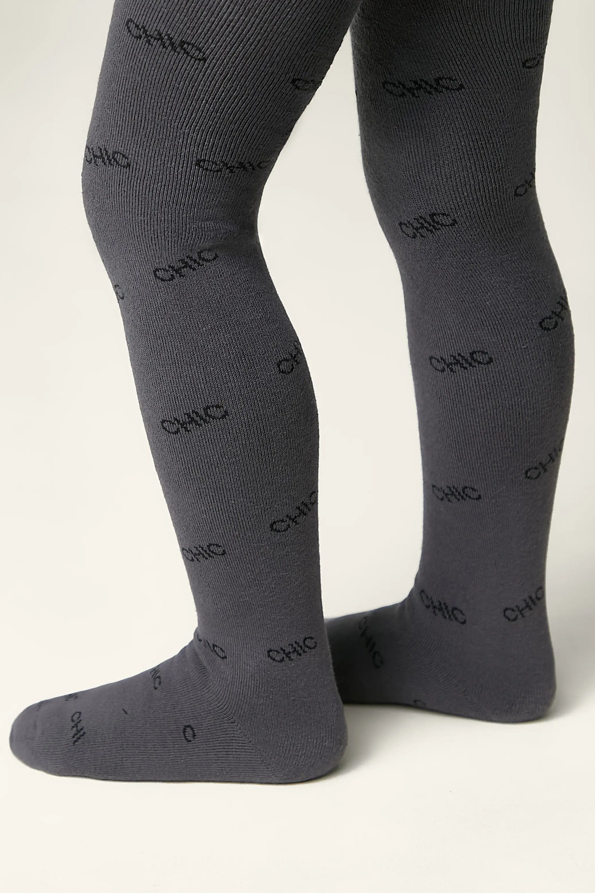 Dark gray tights with 'CHIC' print on a white background #color_dark-gray