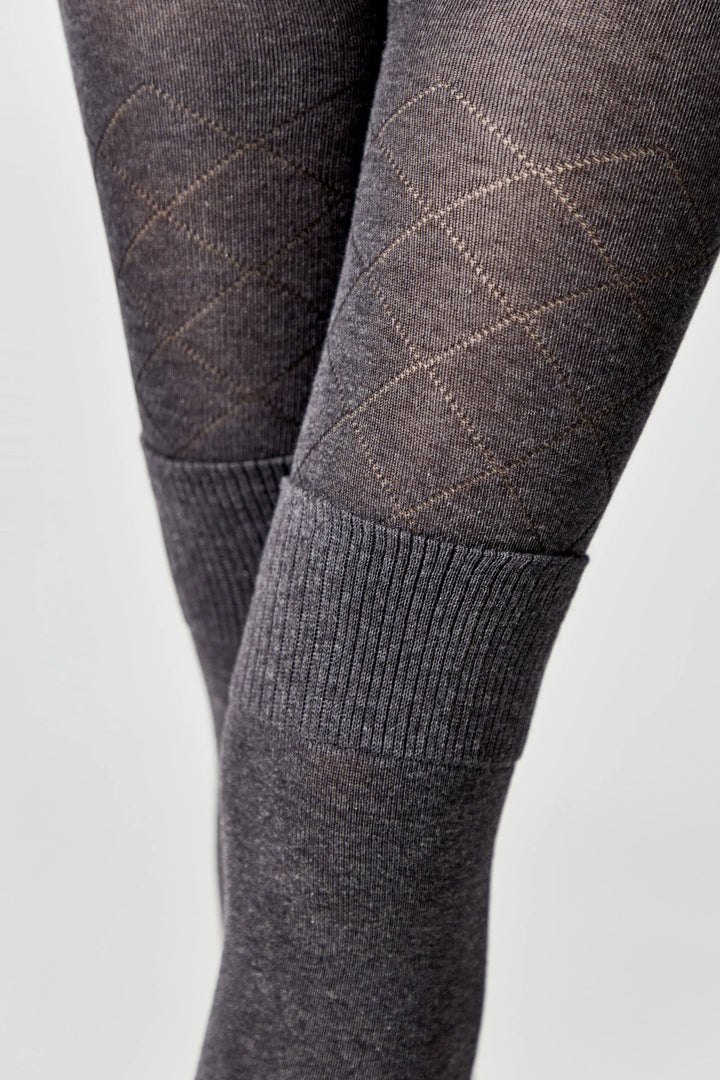 Gray tights with a diamond pattern on a light gray background #color_dark-gray