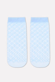 Pair of light blue socks with a textured pattern on a white background #color_light-blue