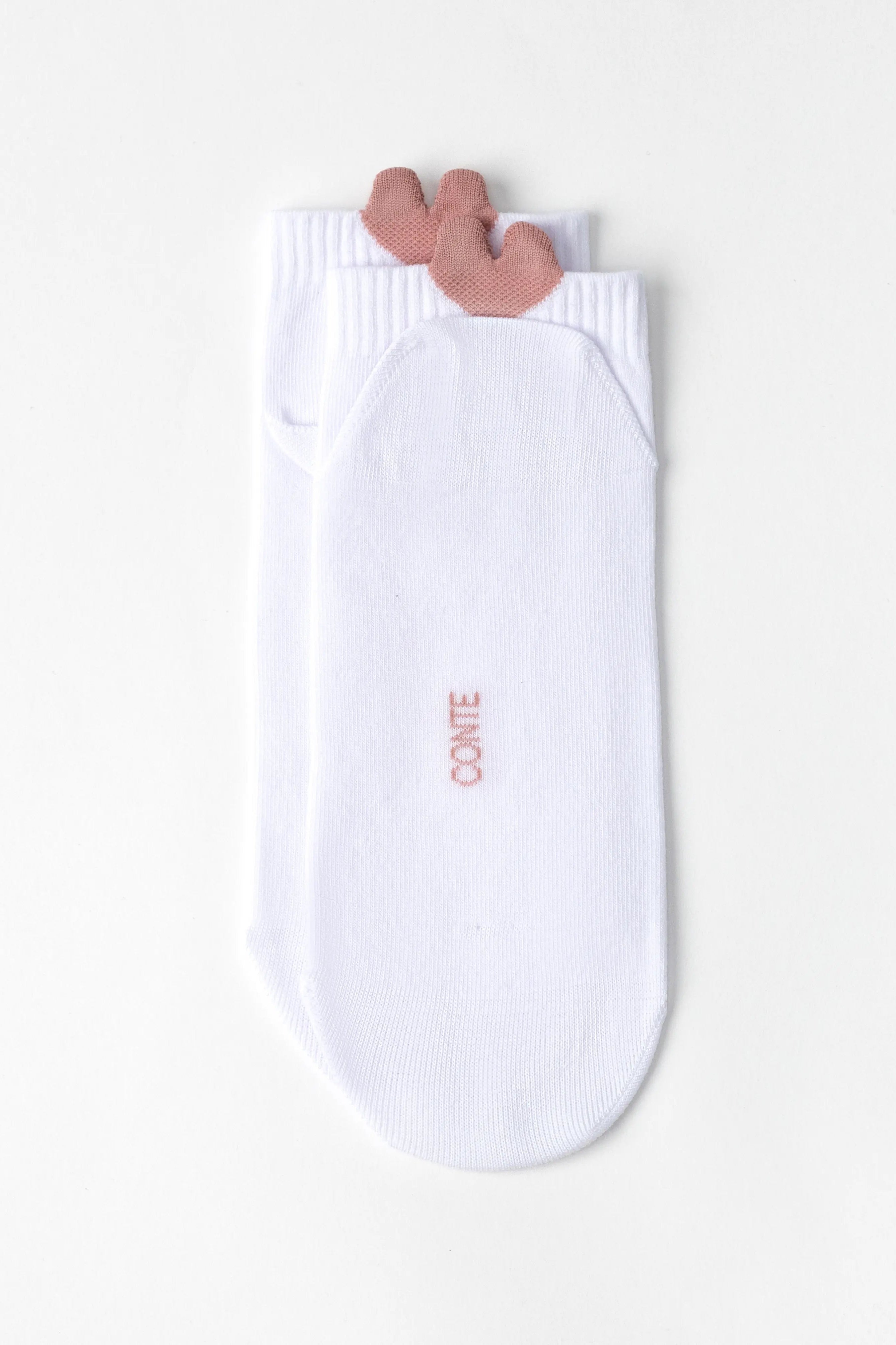 A pair of white ankle socks with a dusty rose pink reindeer antler detail at the top cuff and the brand name 'CONTE' printed in pink on the sole.