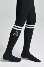Black knee-high socks with white stripes and a logo on a light gray background