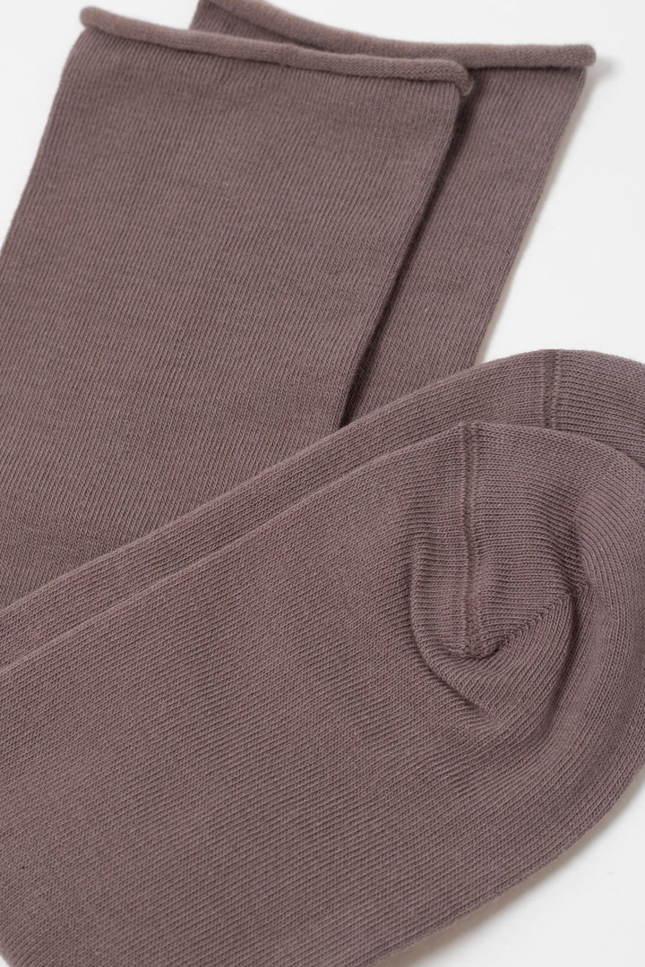 Pair of brown socks on a white background  #color_cocoa