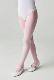 Person wearing pink tights and white shoes on a plain background #color_pink