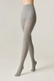 Gray tights worn by a person on a plain background #color_grey