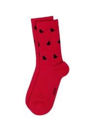 Red socks with black heart patterns on a white background #color_red