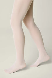 Light pink tights worn by a person on a beige background #color_bianco
