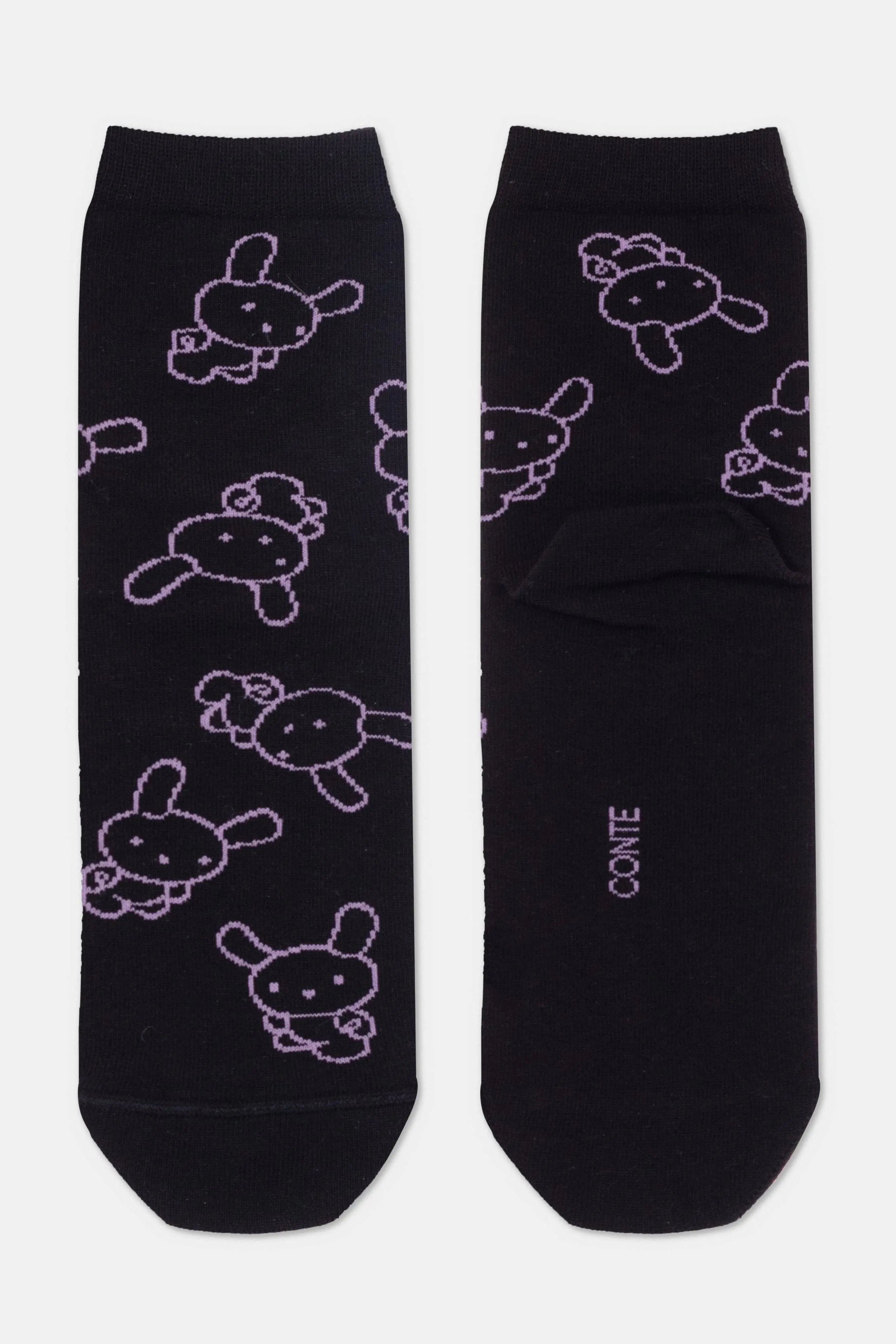 Black socks with purple animal patterns on a white background