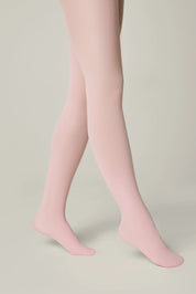 Pink tights worn by a person on a neutral background #color_pink
